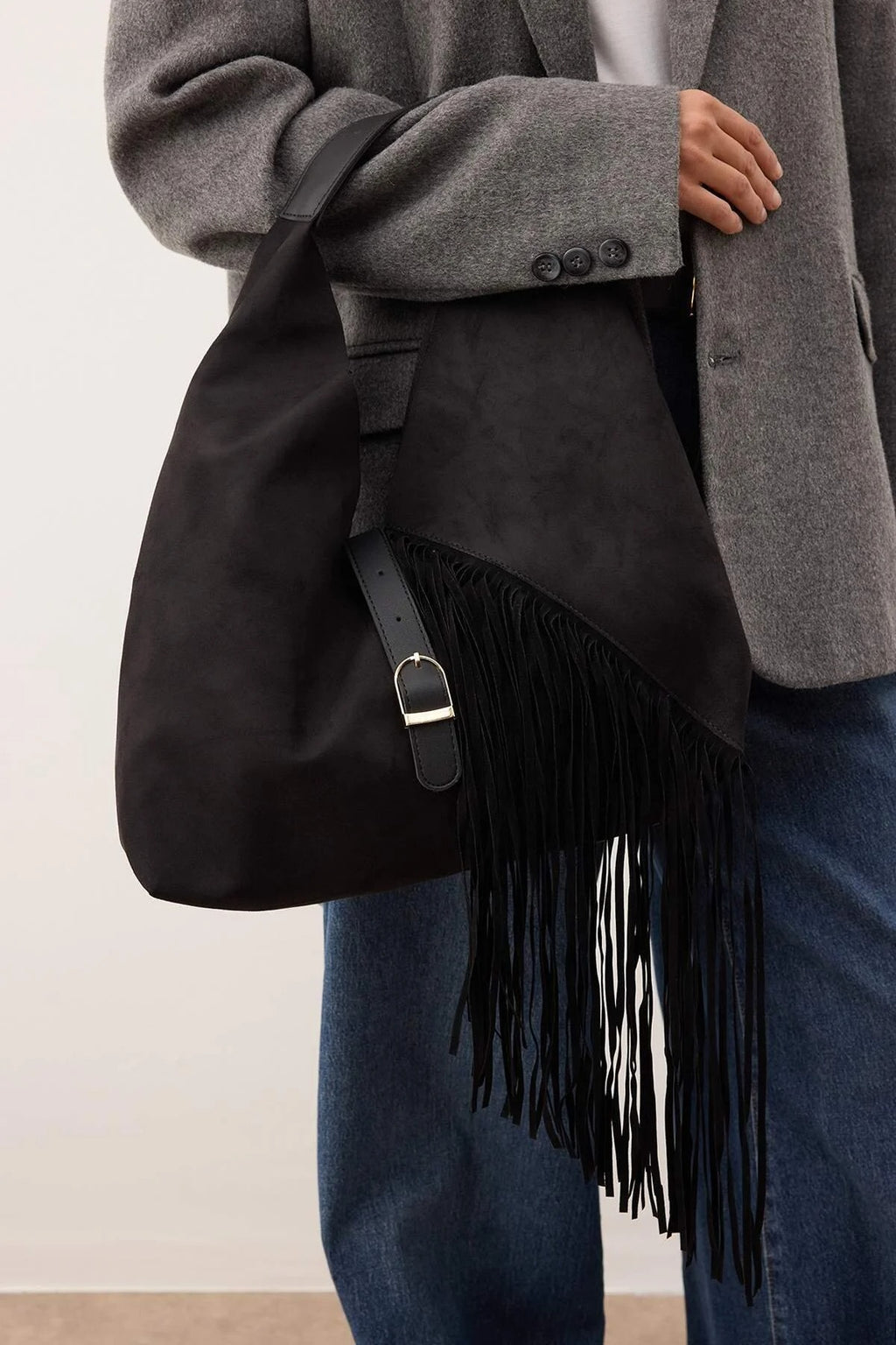 Women's Medium Size Shoulder Bag with Tassel and Buckle Detail