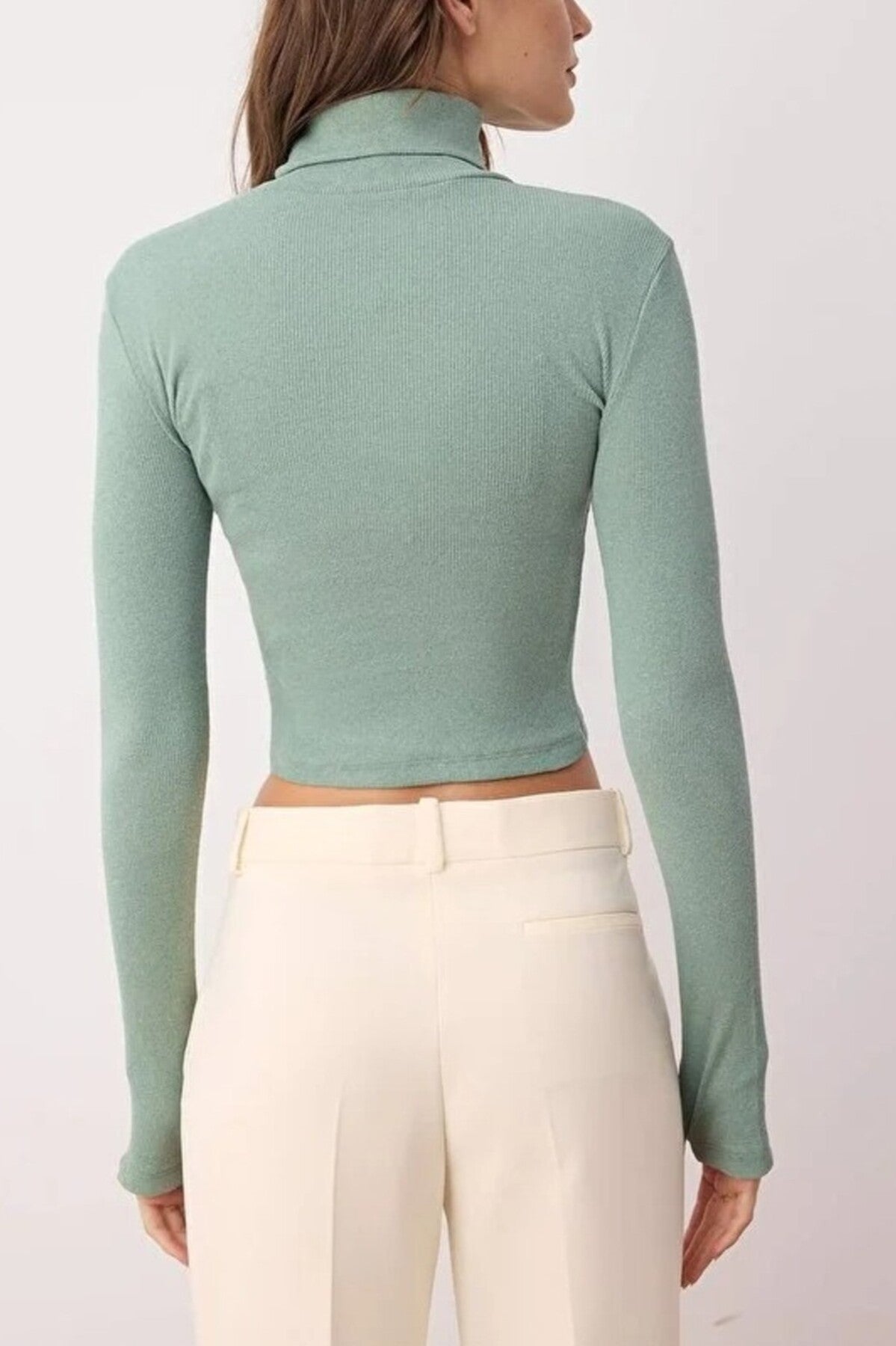 Fitted Turtleneck Knit Blouse with Finger Detail