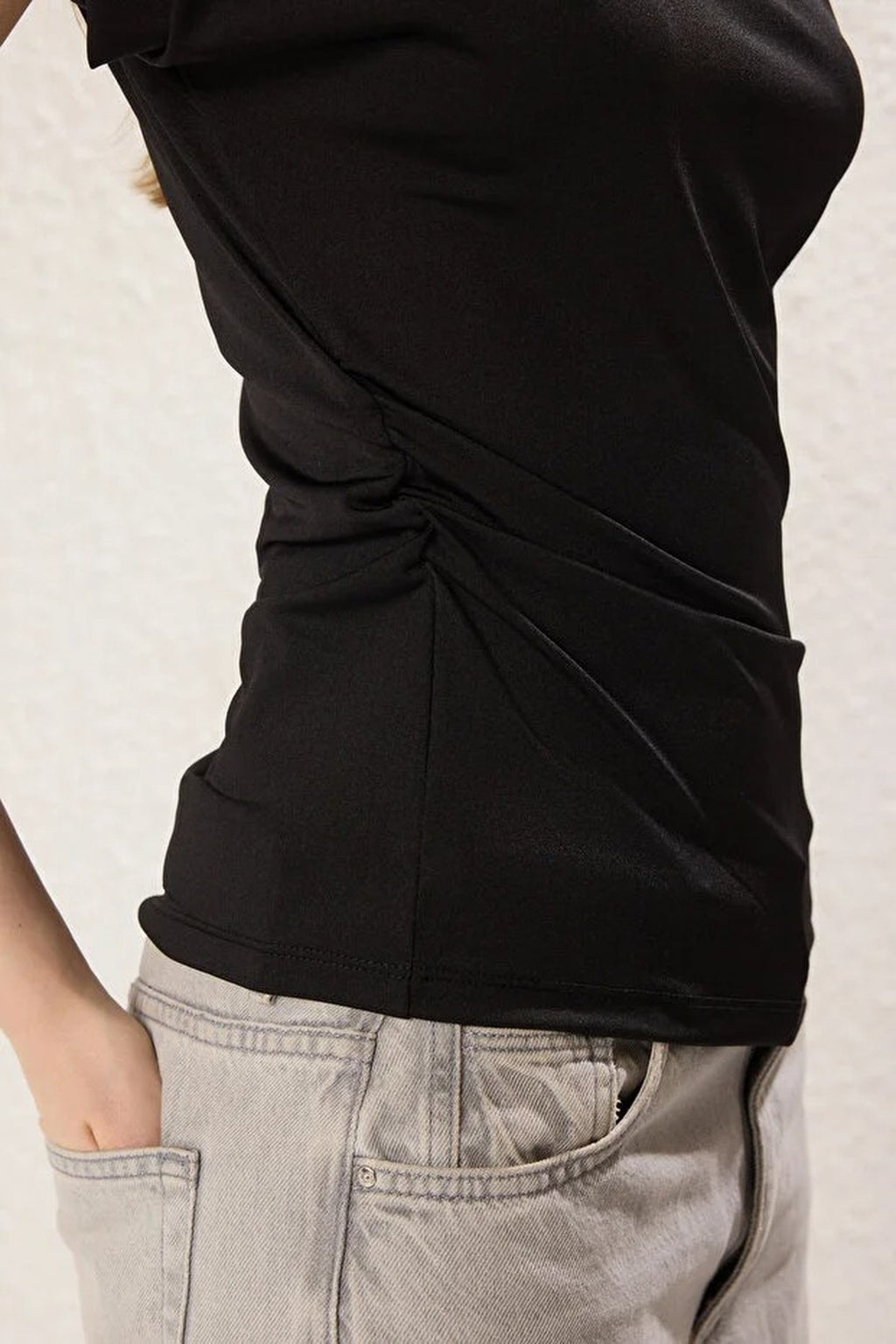 Flexible Knit Blouse with Drape & Pad Detail