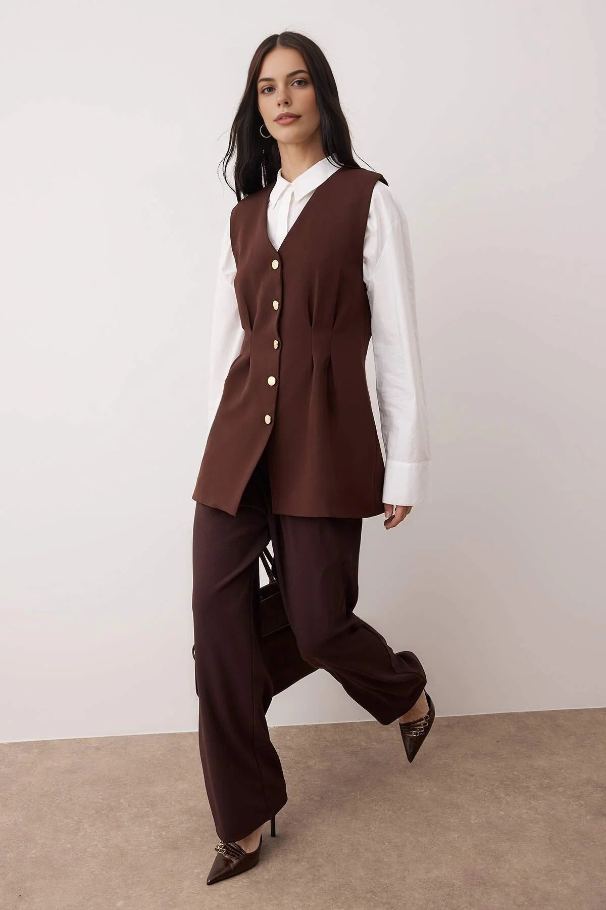 Woven Vest with Peplum and Snaps Detail