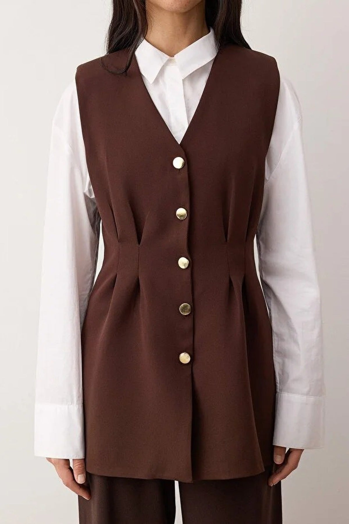 Woven Vest with Peplum and Snaps Detail