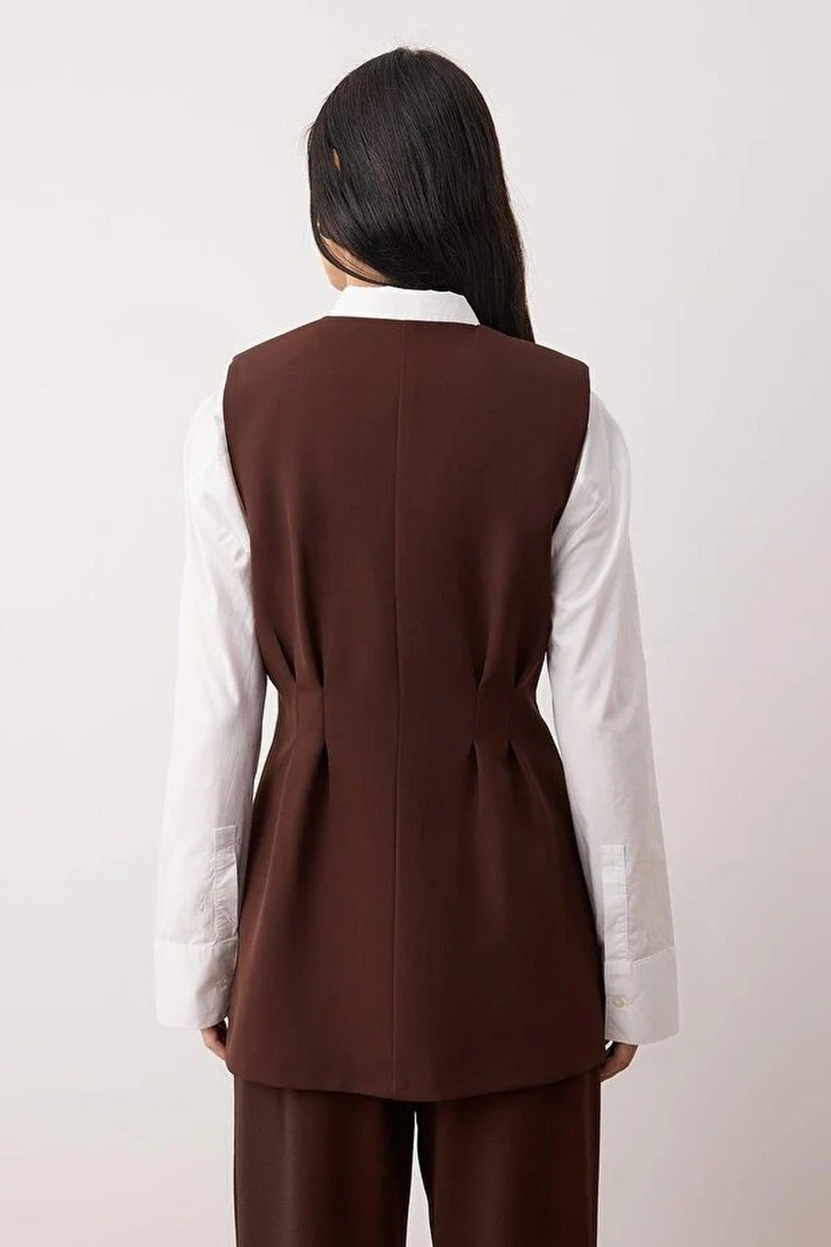 Woven Vest with Peplum and Snaps Detail