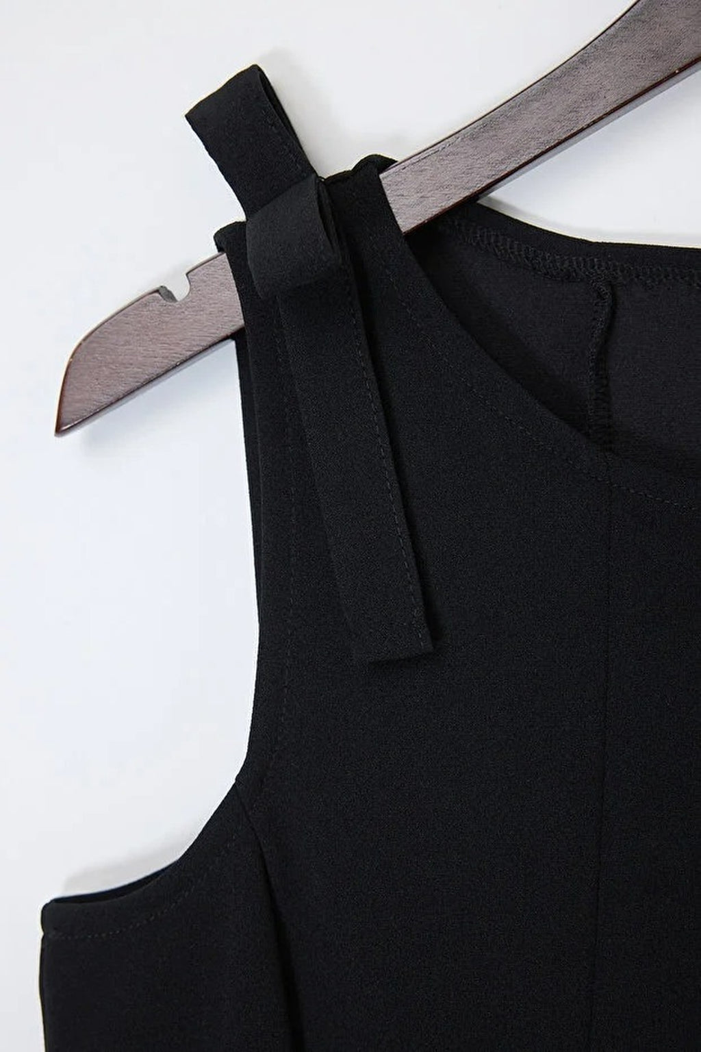 Sleeveless Peplum Blouse with Waist and Shoulder Bow Detail