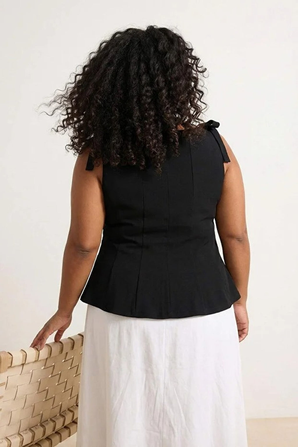 Sleeveless Peplum Blouse with Waist and Shoulder Bow Detail