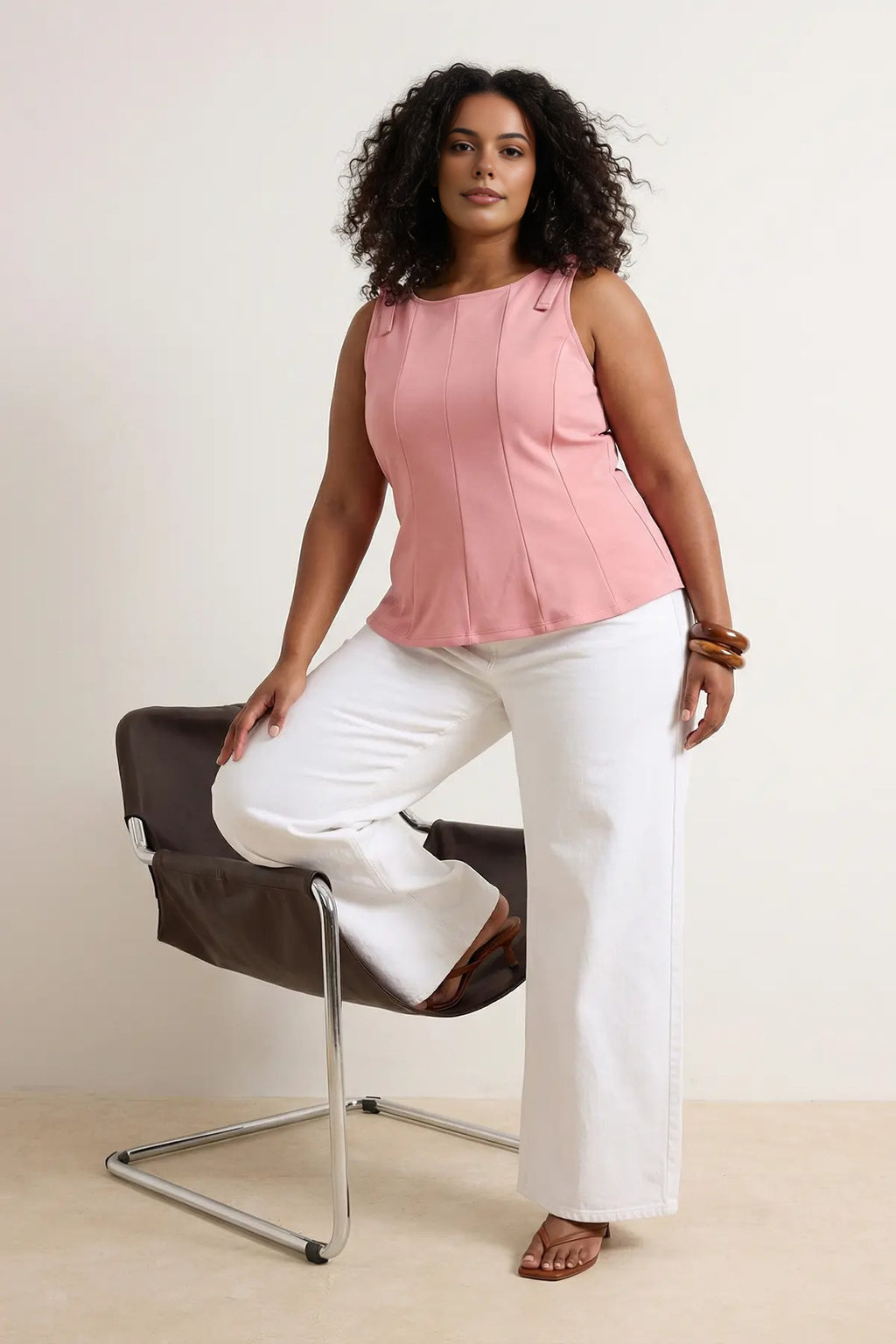 Sleeveless Peplum Blouse with Waist and Shoulder Bow Detail