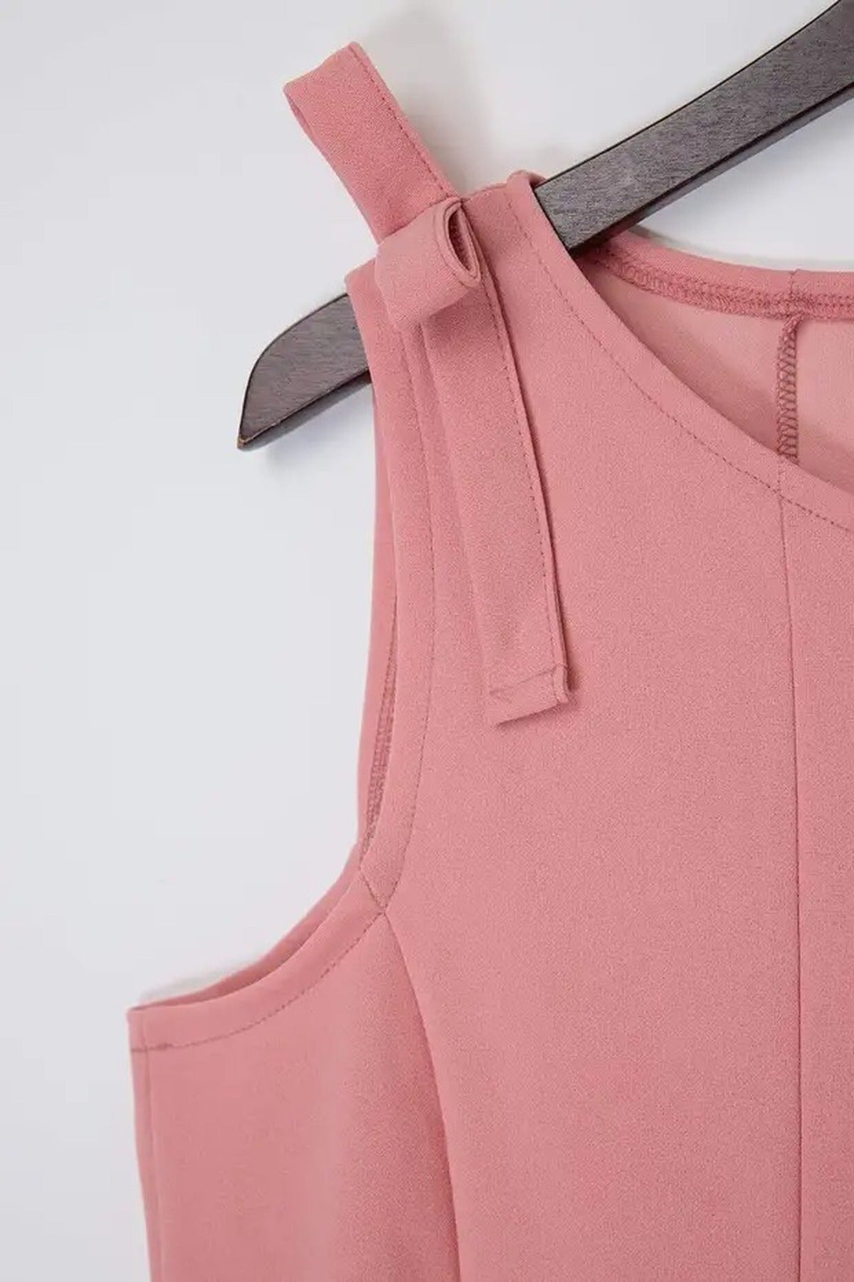Sleeveless Peplum Blouse with Waist and Shoulder Bow Detail