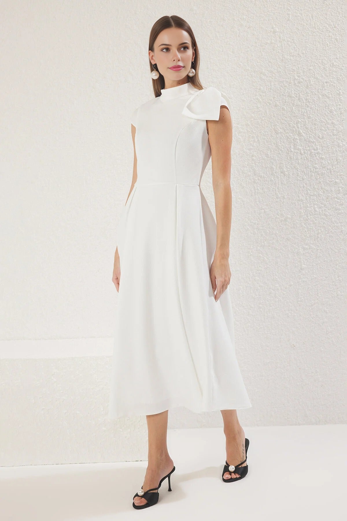 High Neck Pleated Midi Dress with Bow Detail
