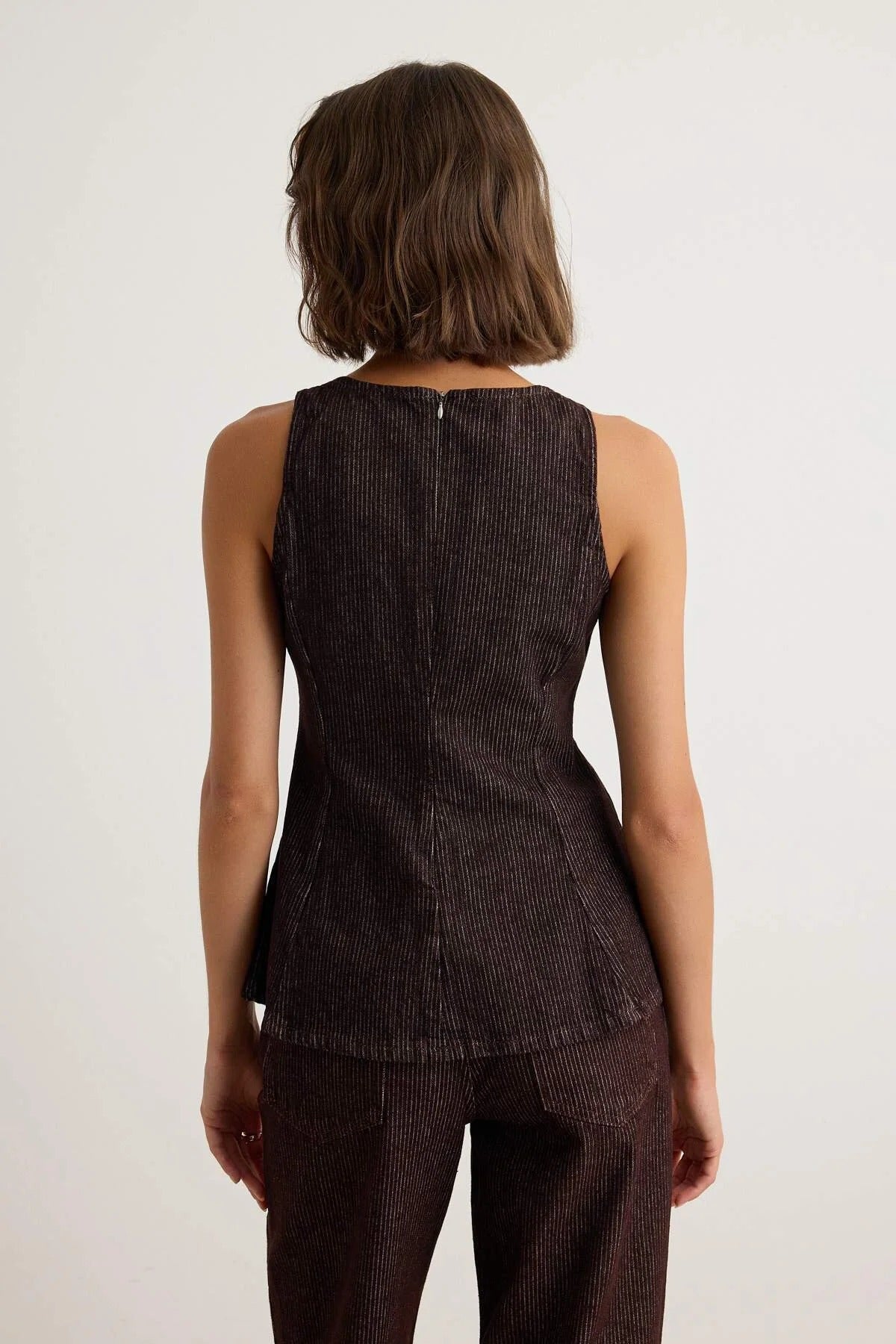 Peplum Sleeveless Blouse