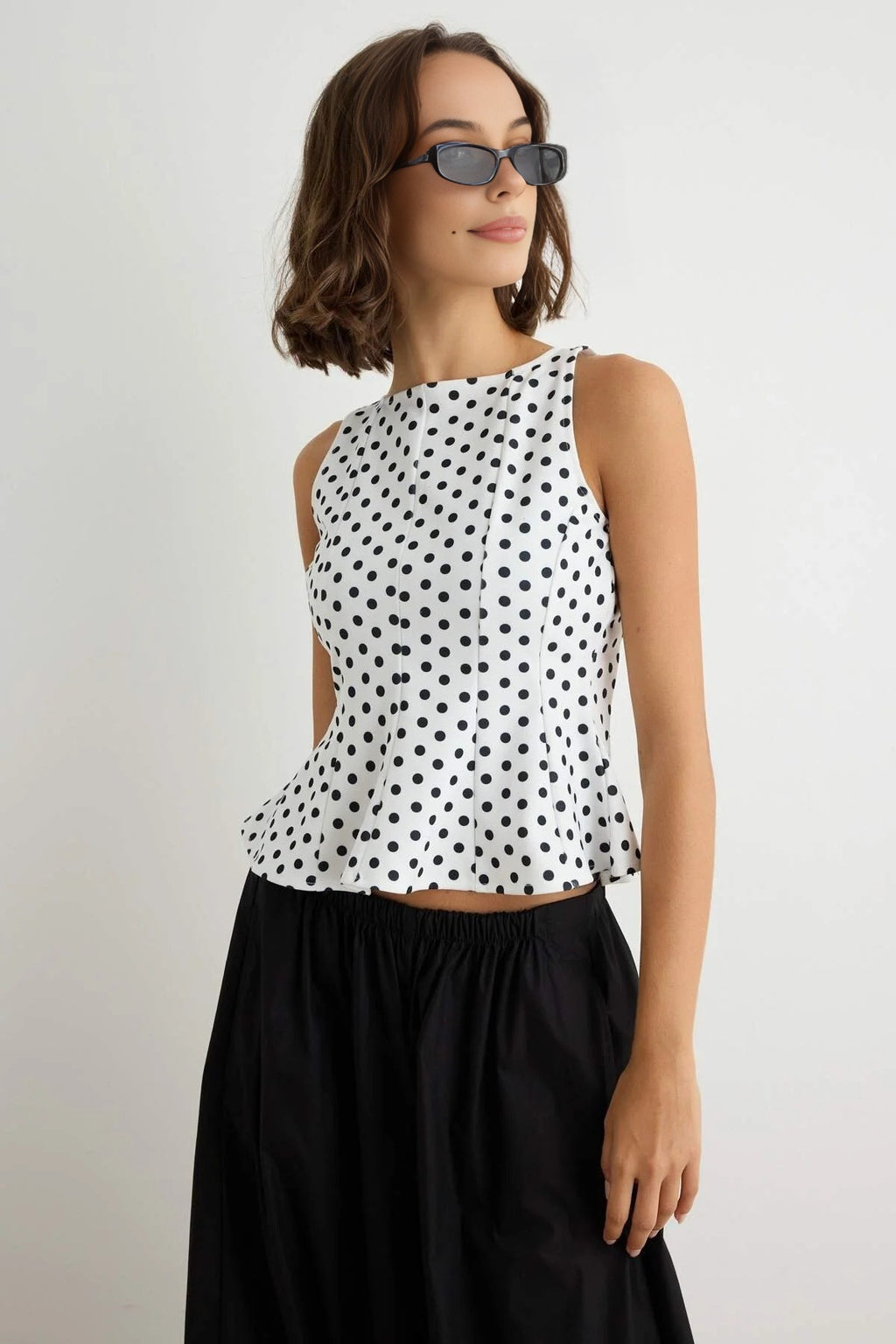 Peplum Sleeveless Boat Neck Knit Blouse
