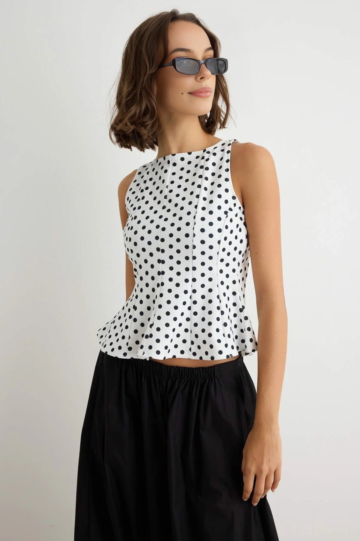 Peplum Sleeveless Boat Neck Knit Blouse