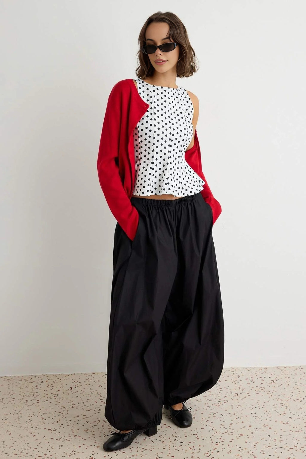 Peplum Sleeveless Boat Neck Knit Blouse