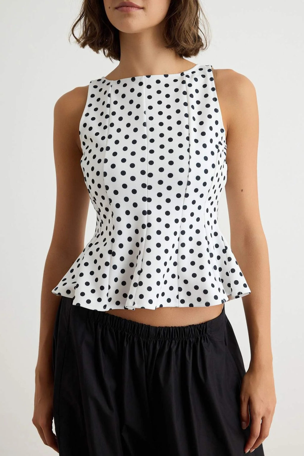 Peplum Sleeveless Boat Neck Knit Blouse