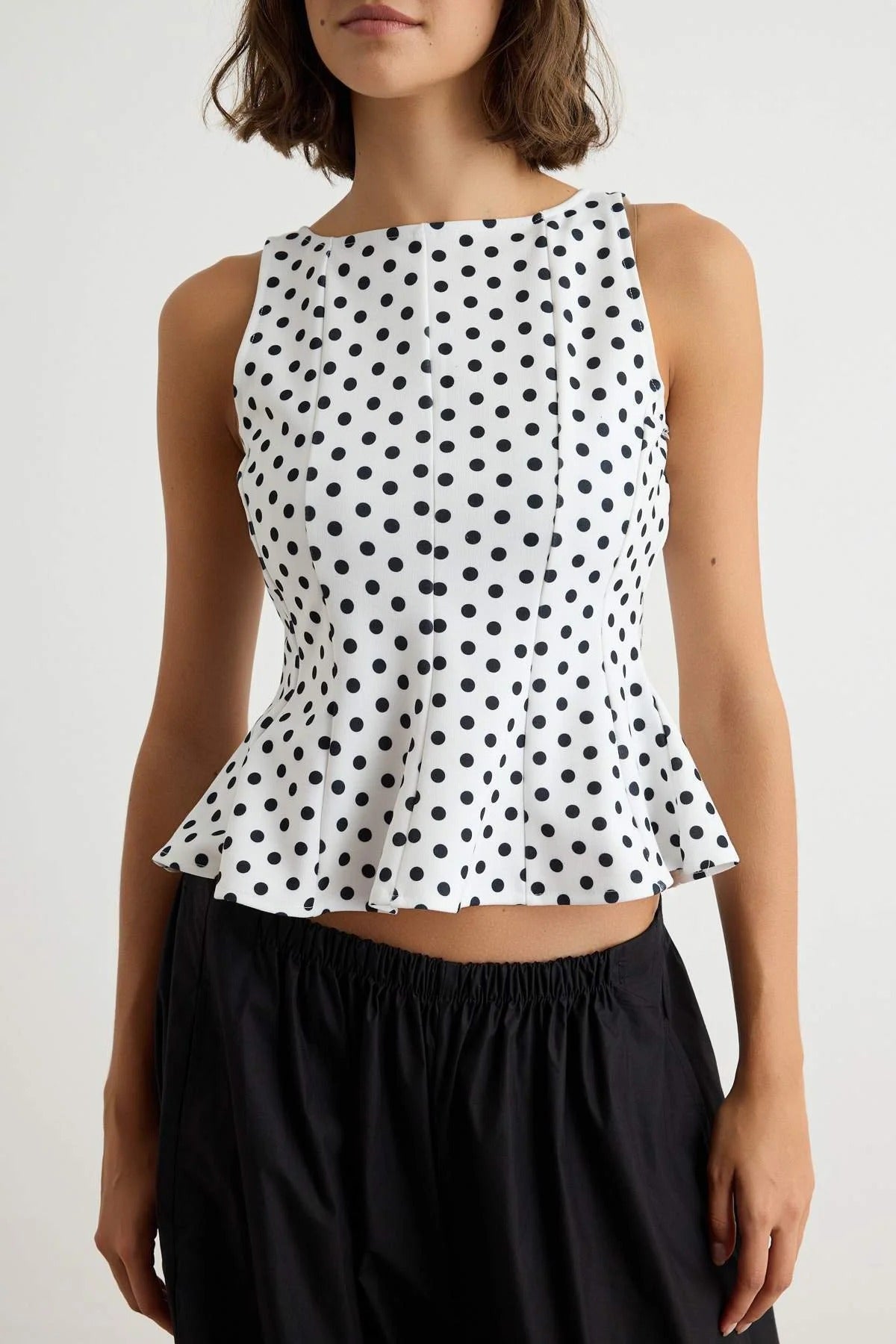 Peplum Sleeveless Boat Neck Knit Blouse