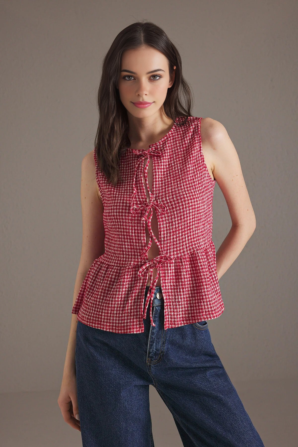 Polka Dot Tie Detail Sleeveless Fitted Knit Blouse