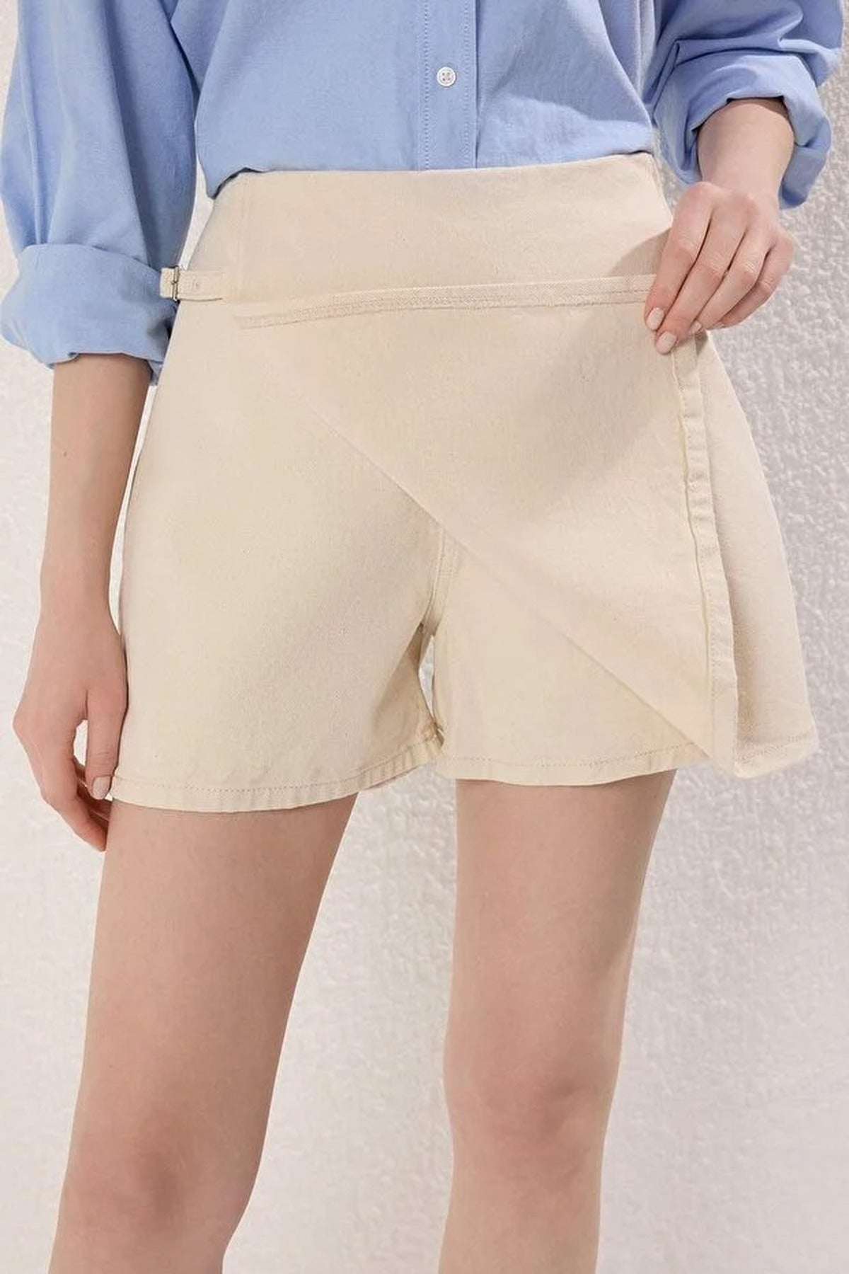 High-Waisted Denim Short Skirt with Accessory Details